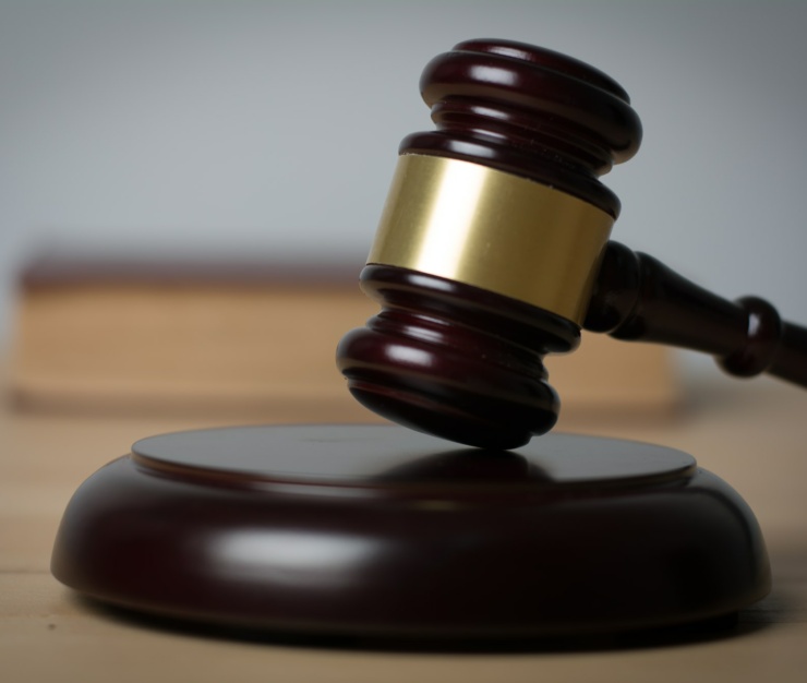 Close up of judge hummer on wooden background.